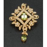 A peridot and seed pearl pendant brooch,