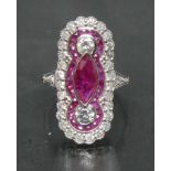 An Art Deco style ruby and diamond ring, central deep red marquise ruby approx 0.