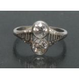 An Art Deco two stone diamond ring,