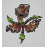 A white coloured metal enamel and marcasite foxglove brooch, in green, purple and orange, c.