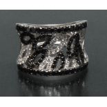 A contemporary certified fancy black and white diamond dress ring,