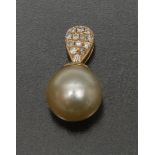 A south sea cultured pearl and diamond pendant, single light golden creamy pearl, approx 11.