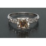 A contemporary certified fancy Champagne diamond ring,