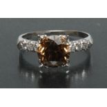 A contemporary certified fancy Cognac diamond ring,