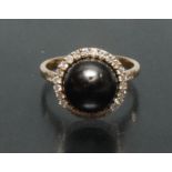 A Tahitian cultured pearl and diamond ring, single grey/black pearl, approx 9.