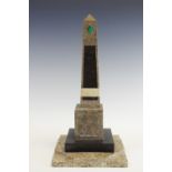 A 19th century Derbyshire fossil stone and Ashford marble library obelisk,