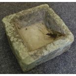 A Medieval limestone holy water stoup or piscina,
