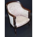 A 19th century mahogany tub chair, arched arm rail scrolled terminals, turned baluster uprights,