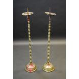 A pair of 19th century brass floor standing pricket candlesticks, of Charles II design,