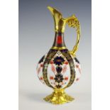 A Royal Crown Derby Imari 1128 pattern Kedleston ewer, scroll handle, quatrefoil base, 26cm high,