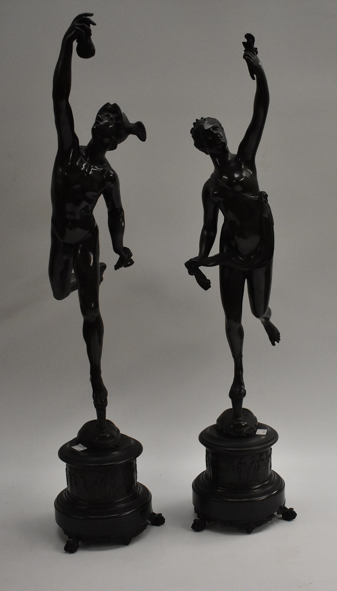 After Giambologna (Italian 19th century), a pair of dark patinated Grand Tour bronzes,