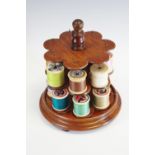 Sewing - a 19th century mahogany revolving two-tier cotton feel stand, turned finial and base,