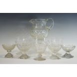 A pair of 19th century clear glass pedestal navette shaped salt cellars, hobnail cut band,