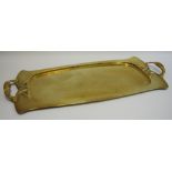 An Arts and Crafts Joseph Sankey & Sons shaped rectangular brass tray, sinuous handles, hammered,