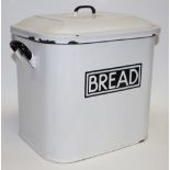 An early 20th century enamel bread bin and cover,