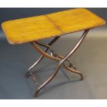 A 19th century mahogany folding coaching table, turned stretchers,
