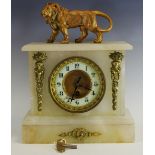 A 19th century Alabaster clock garniture, the 11cm Arabic numerals,