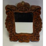 A 19th century shaped rectangular looking glass,