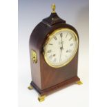 A Franz Hermle Comitti of London arched top mahogany mantel clock, with Roman numerals,