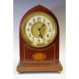 An Edwardian inlaid mahogany lancet mantel clock, with Arabic numerals,