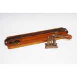 An oak game carrier, brass mounts, leather strap,