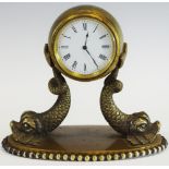 A 19th century bronzed clock, by Benson, 5cm diam with Roman numerals,