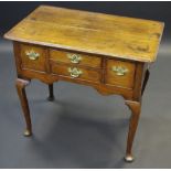 A George III oak low boy, moulded top, four short drawers to frieze, cabriole legs, 72cm high,