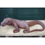 Garden statuary - a carved wooden Kimodo dragon,