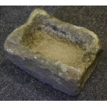 A Medieval limestone holy water stoup,
