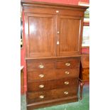 An early 20th century oak linen press,