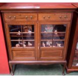 A 20th century mahogany bookcase,