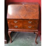 A 20th century walnut bureau,