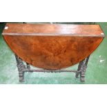 A Victorian walnut Sutherland table, moulded oval top with fall leaves,