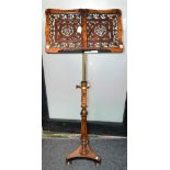 A William IV style walnut veneered music stand,