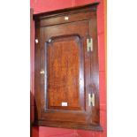 A 19th century oak corner cupboard, of small proportions,