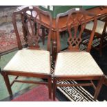 A set of six George III mahogany dining chairs, c.