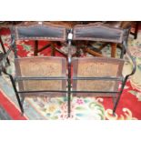 An early 20th century cast metal framed theatre bench, self-tilting seats,