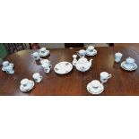 A Continental tea set, for six, printed with Summer Roses, comprising teapot,