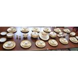 A Minton Buckingham pattern dinner and tea service for twelve including dinner plates, side plates,