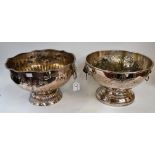 A silver on copper punch bowl, gadrooned rim, embossed throughout flowers and foliage,