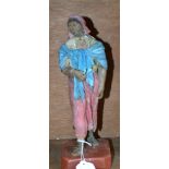 An Indian composition figure, of a female peasant carrying her child,