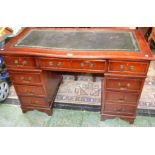 A reproduction mahogany twin pedestal writing desk,