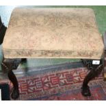 A 19th century mahogany stool, rectangular seat, cabriole legs carved to the knees with shells,