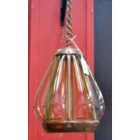 An Art Nouveau copper and blown glass hanging lantern