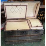 A 20th century metal mounted trunk, hinged dome cover enclosing three card lined compartments,