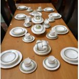 A Royal Doulton Rondelay pattern dinner service, comprising dinner plates, salad plates,