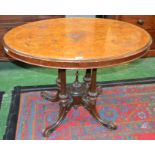 A 19th century walnut centre/loo table, quarter-veneered oval top inlaid with scrolling foliage,