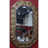 A early/mid 20th century brass framed mirror, bevelled glass,