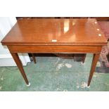 An early 20th century mahogany tea table,