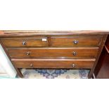 An early 20th century mahogany chest of two short over two long drawers,